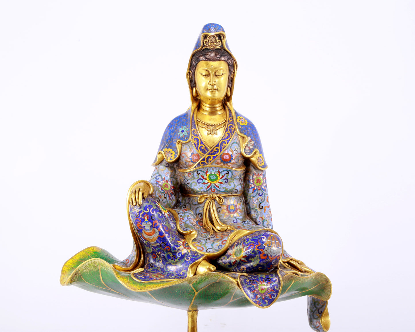 A serene cloisonné statue of Guanyin