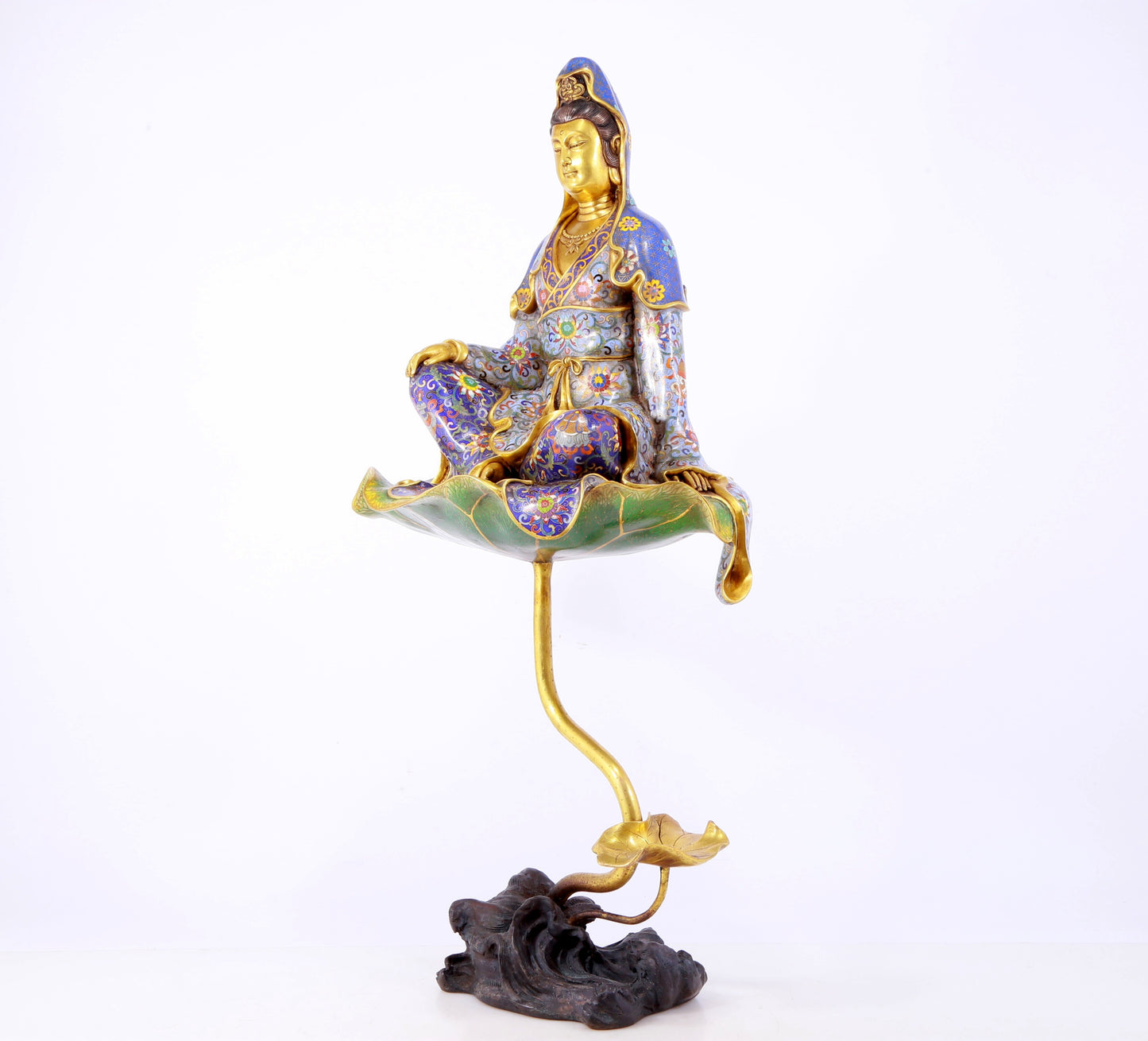 A serene cloisonné statue of Guanyin