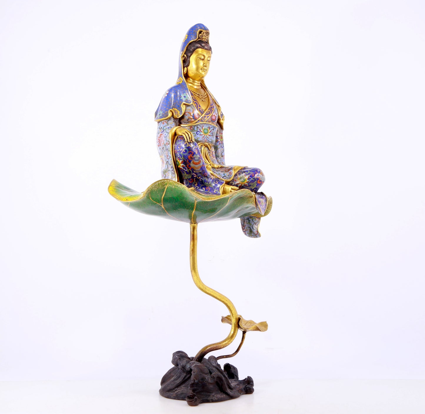 A serene cloisonné statue of Guanyin