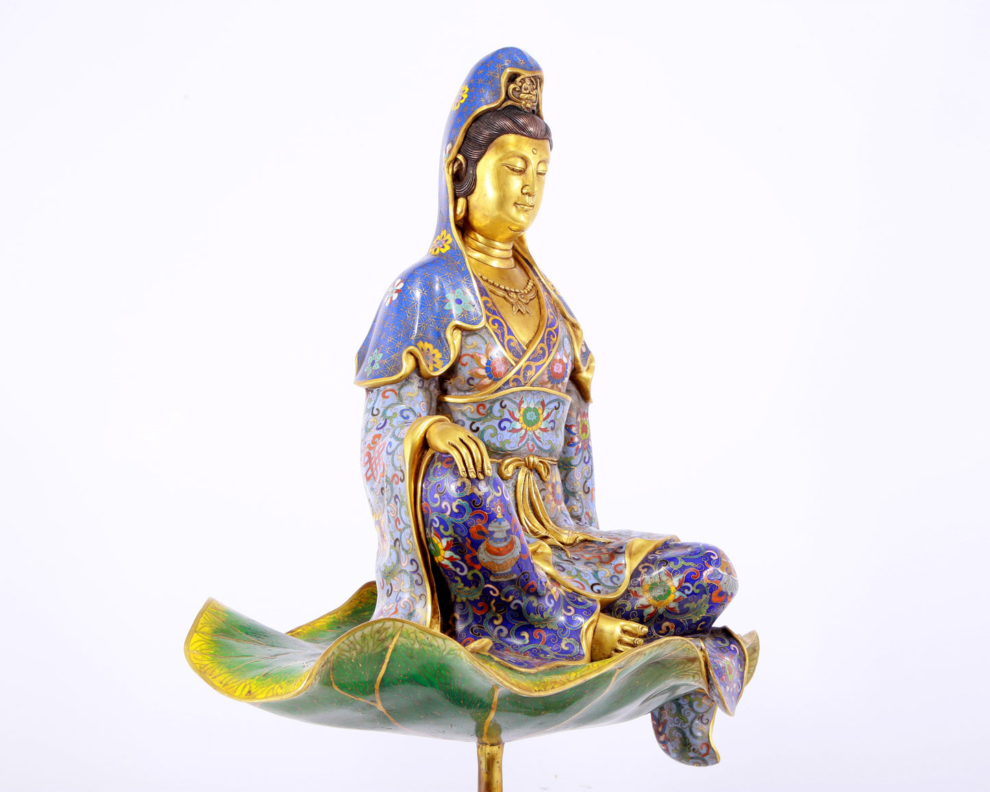 A serene cloisonné statue of Guanyin