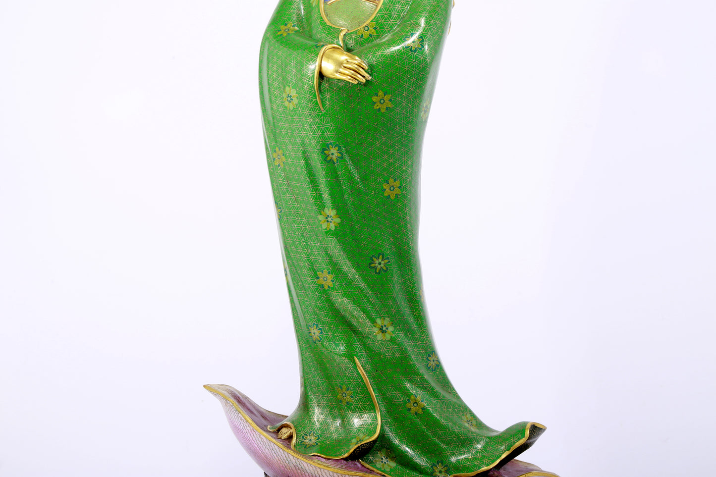 A serene cloisonné statue of Guanyin