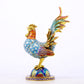 An exquisite cloisonné rooster ornament