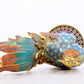 An exquisite cloisonné rooster ornament