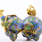 An exquisite cloisonné gourd vase