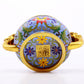 An exquisite cloisonné tangled lotus pattern double-eared censer with lid