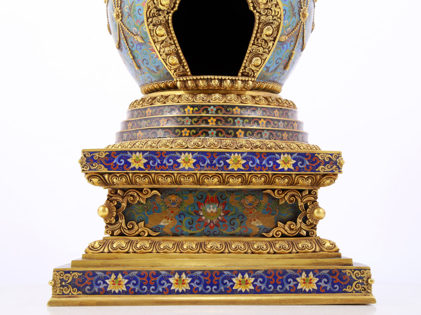 A rare cloisonné Buddhist niche with twining branches and lotus pattern