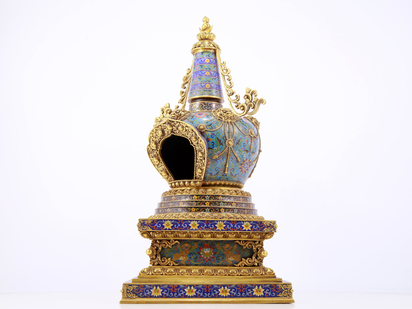 A rare cloisonné Buddhist niche with twining branches and lotus pattern