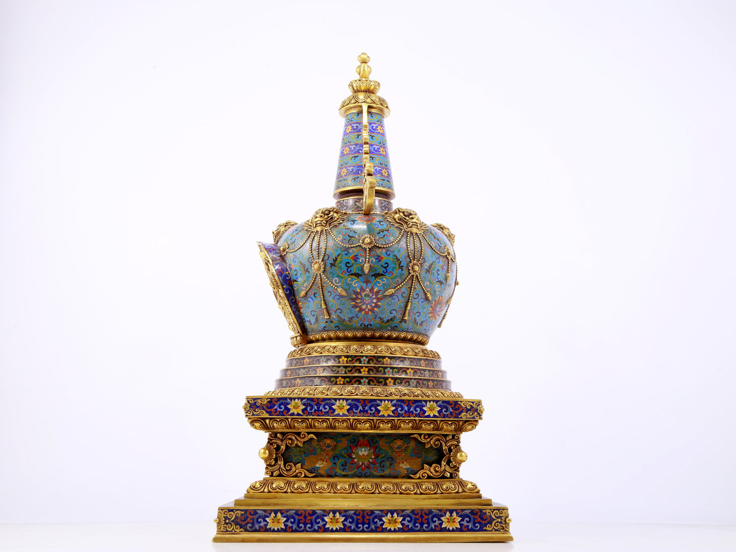 A rare cloisonné Buddhist niche with twining branches and lotus pattern