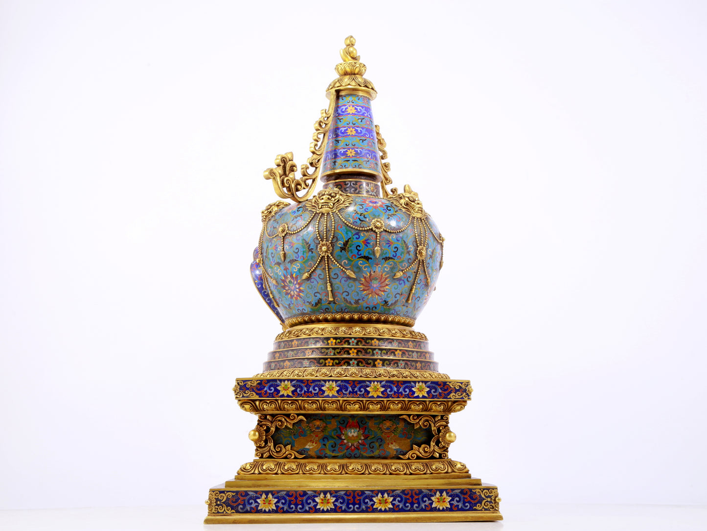 A rare cloisonné Buddhist niche with twining branches and lotus pattern