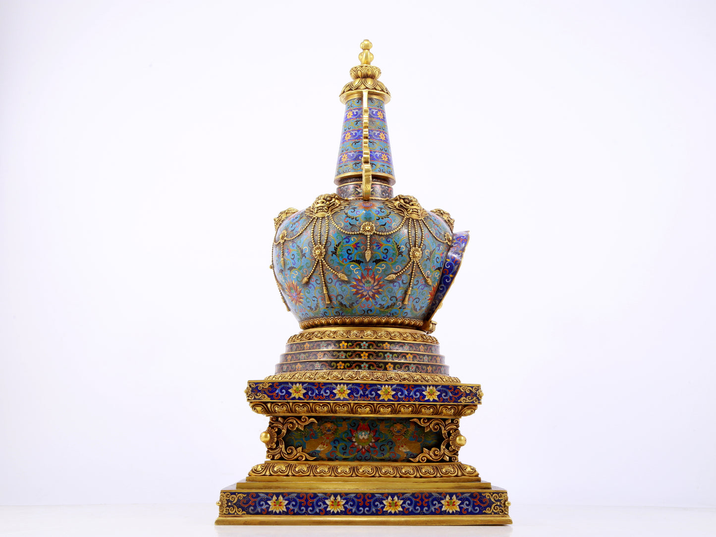 A rare cloisonné Buddhist niche with twining branches and lotus pattern