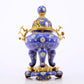 An exquisite cloisonné tangled lotus pattern two-eared tripod censer with lid