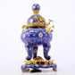 An exquisite cloisonné tangled lotus pattern two-eared tripod censer with lid