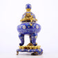 An exquisite cloisonné tangled lotus pattern two-eared tripod censer with lid