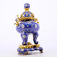 An exquisite cloisonné tangled lotus pattern two-eared tripod censer with lid