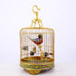 An exquisite cloisonné birdcage with lotus pattern