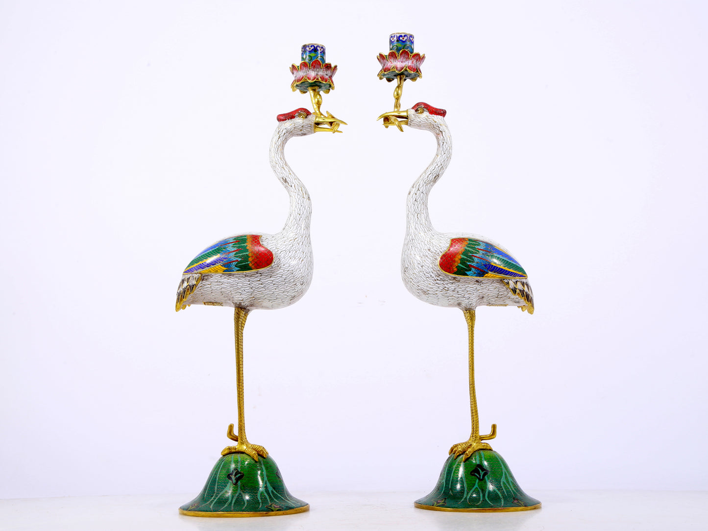 A pair of exquisite cloisonné crane-shaped candlesticks