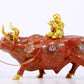 An exquisite cloisonné cow ornament