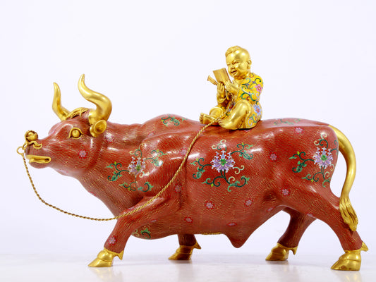 An exquisite cloisonné cow ornament