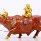 An exquisite cloisonné cow ornament