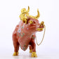 An exquisite cloisonné cow ornament