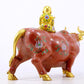 An exquisite cloisonné cow ornament