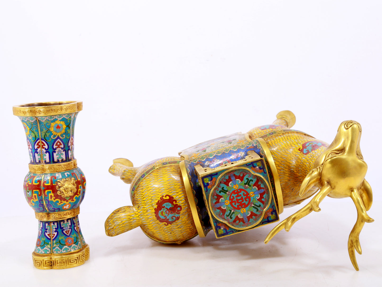 A stunning pair of cloisonné deer-shaped bottles