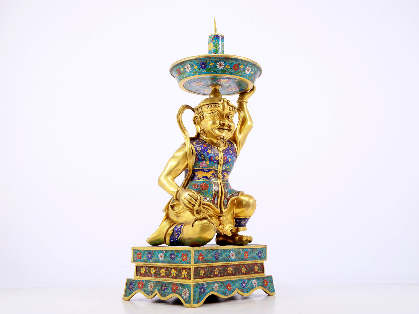 A stunning pair of cloisonné figure candlesticks