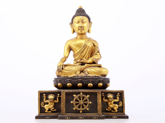 A sacred gilt bronze statue of Gautama Buddha