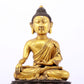 A sacred gilt bronze statue of Gautama Buddha