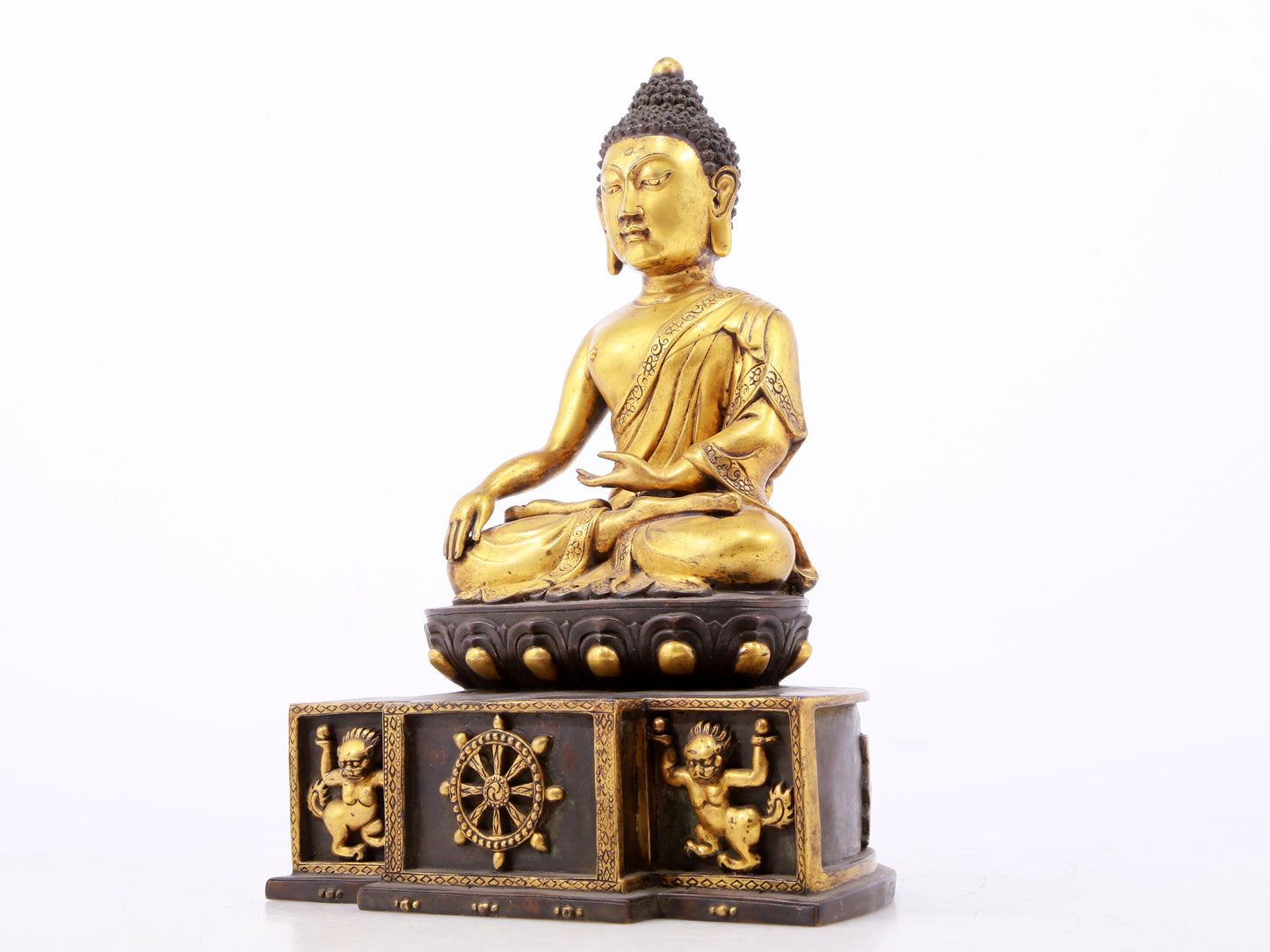 A sacred gilt bronze statue of Gautama Buddha