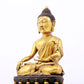 A sacred gilt bronze statue of Gautama Buddha