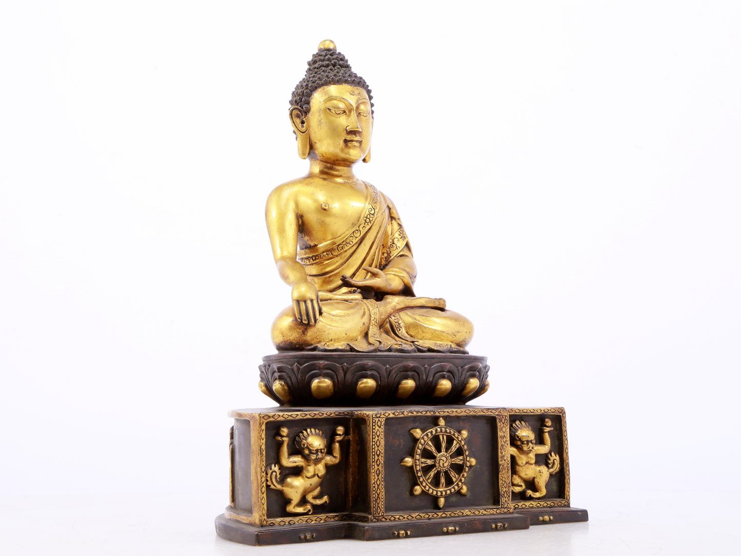 A sacred gilt bronze statue of Gautama Buddha