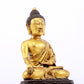 A sacred gilt bronze statue of Gautama Buddha