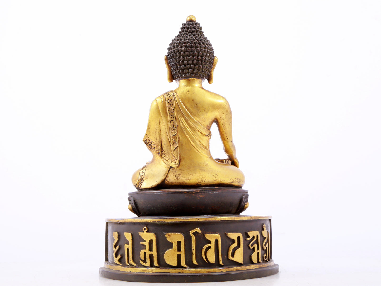 A sacred gilt bronze statue of Gautama Buddha