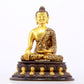 A sacred gilt bronze statue of Gautama Buddha