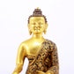 A sacred gilt bronze statue of Gautama Buddha