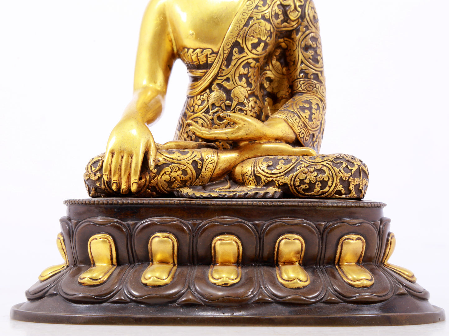 A sacred gilt bronze statue of Gautama Buddha