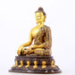 A sacred gilt bronze statue of Gautama Buddha