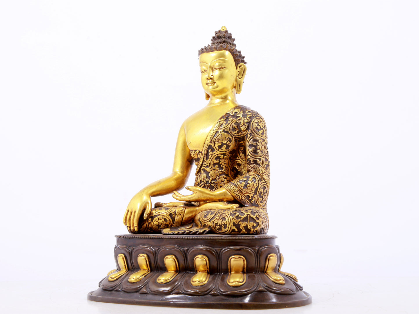 A sacred gilt bronze statue of Gautama Buddha