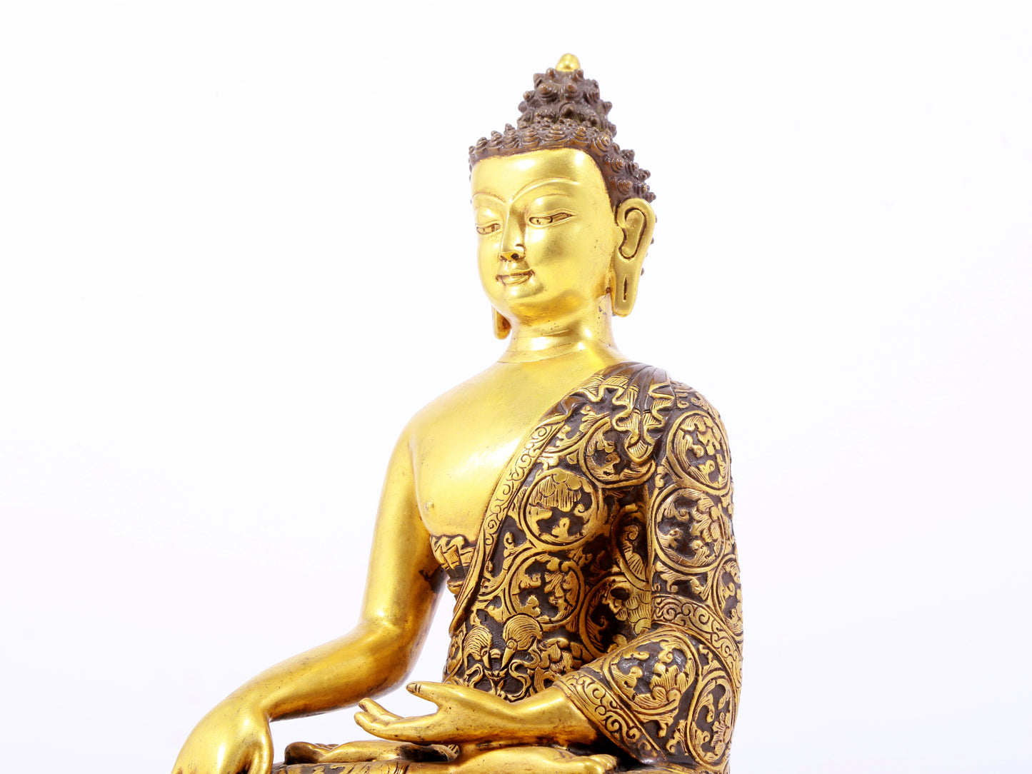 A sacred gilt bronze statue of Gautama Buddha