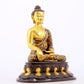 A sacred gilt bronze statue of Gautama Buddha