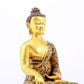 A sacred gilt bronze statue of Gautama Buddha