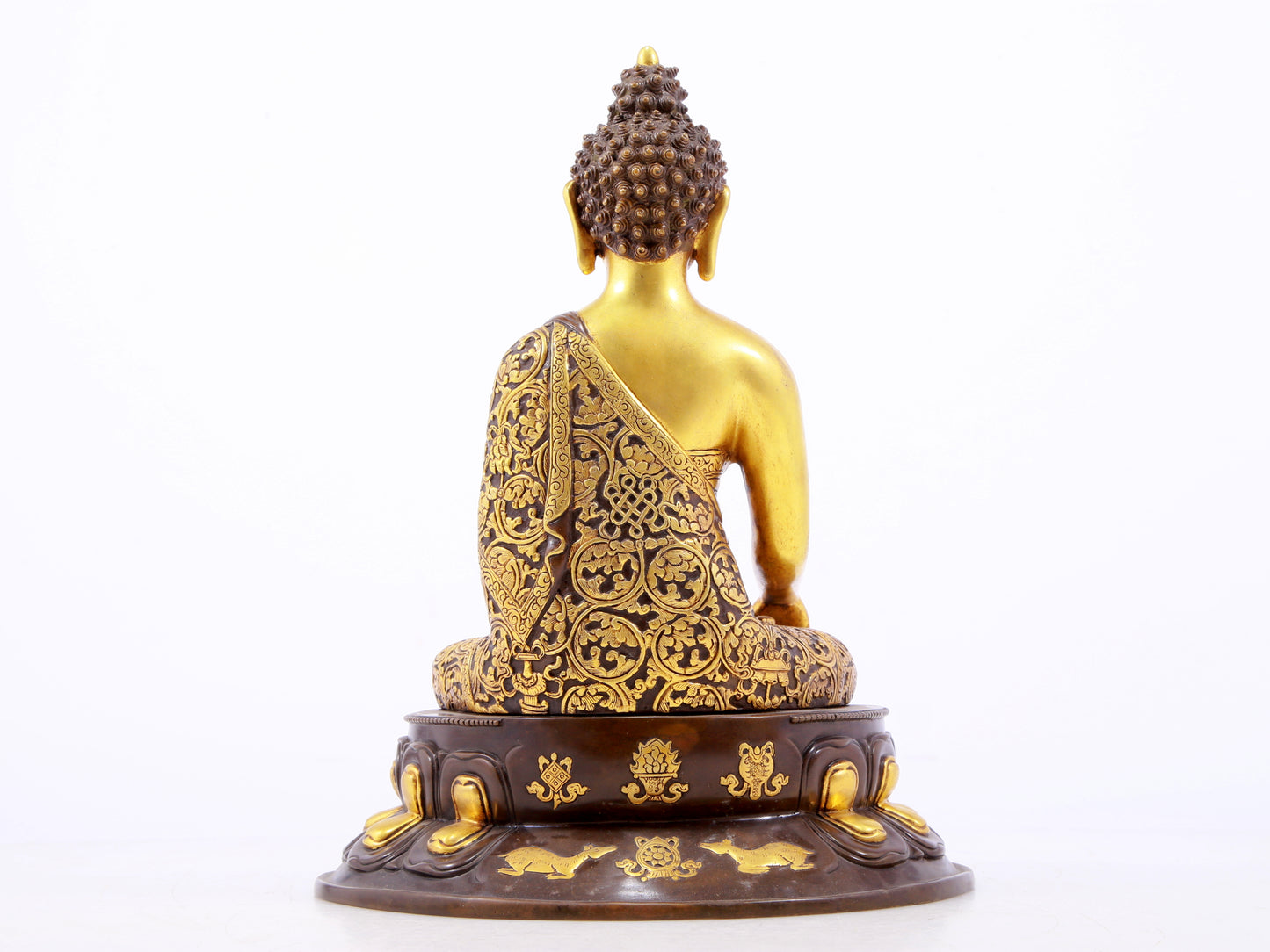 A sacred gilt bronze statue of Gautama Buddha