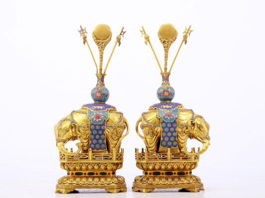 A stunning pair of cloisonné elephant ornaments