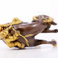 An exquisite gilt bronze boy herding cows