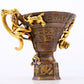 An exquisite gilt copper cup with dragon pattern