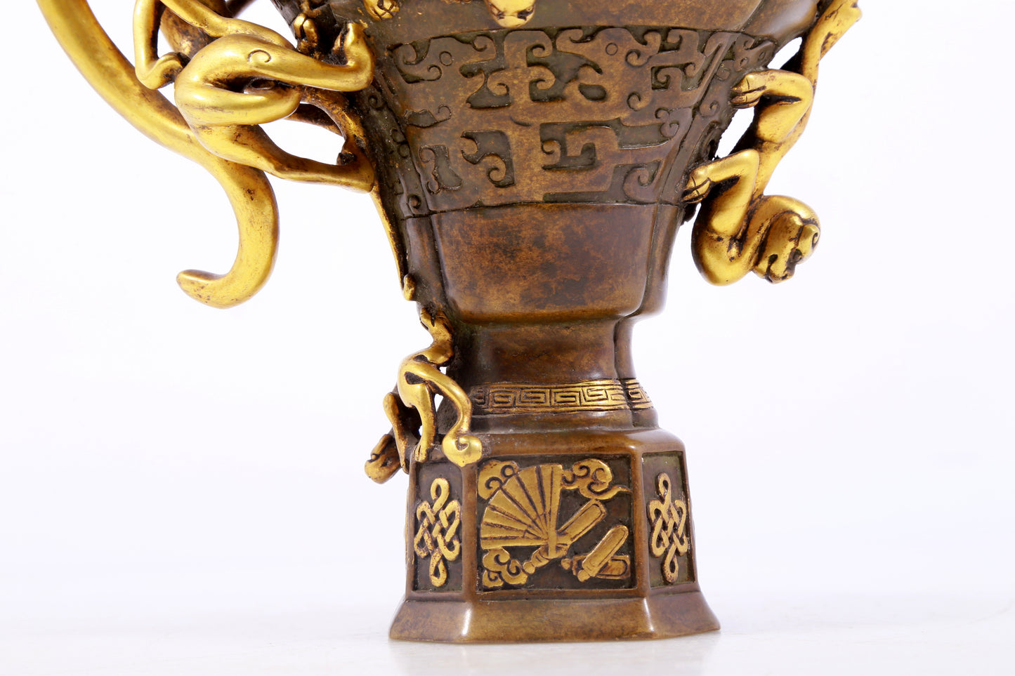 An exquisite gilt copper cup with dragon pattern