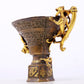 An exquisite gilt copper cup with dragon pattern