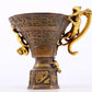 An exquisite gilt copper cup with dragon pattern