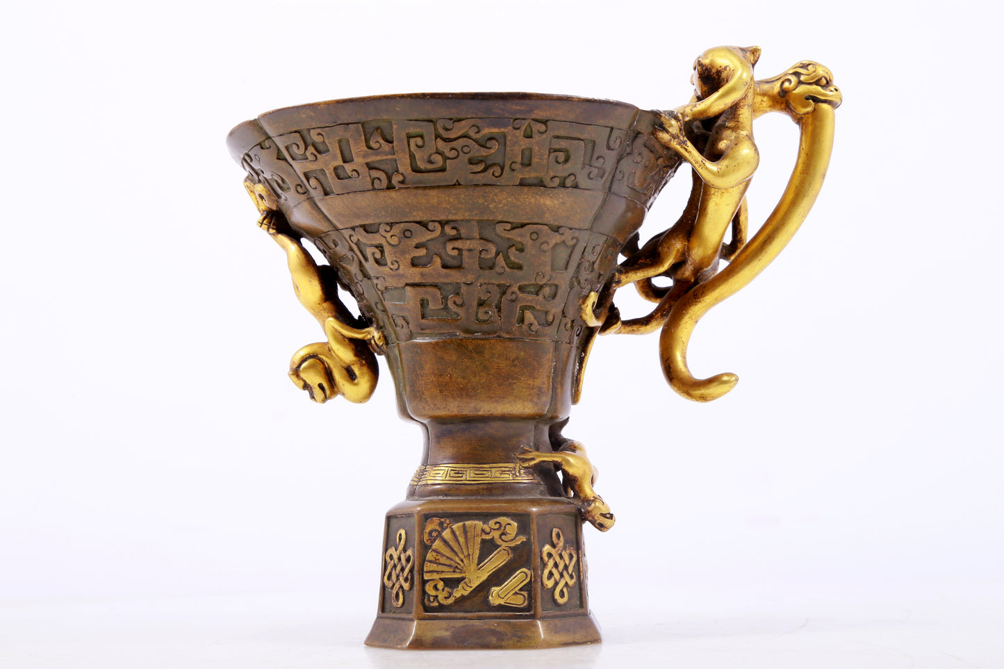 An exquisite gilt copper cup with dragon pattern